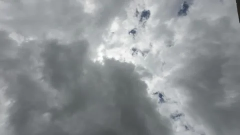 White Clouds Moving Fast At Viewer In The Hot Sun On Blue Sky Timelapse Video Stock Footage 283801514