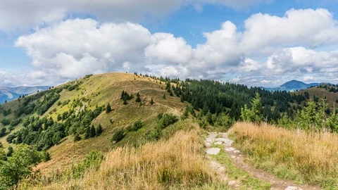 White clouds moving over mountains nature in sunny autumn Time lapse Stock Footage 116104212