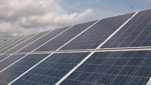 White clouds moving over solar panel Stock Footage 93523252