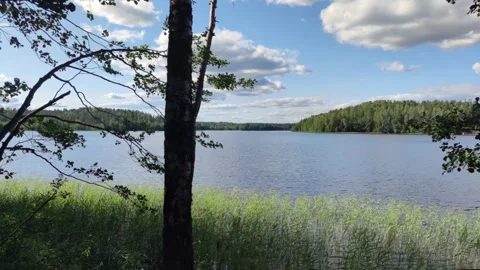 White clouds over a blue lake. Stock Footage 164879073