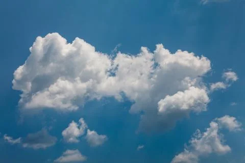 White clouds over blue Stock Photos