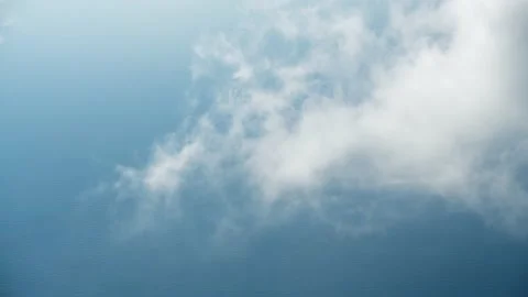 White clouds over the blue sea. Stock Footage 180544227