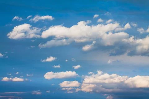 White clouds over blue sky Stock Photos