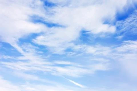White clouds over blue sky Stock Photos