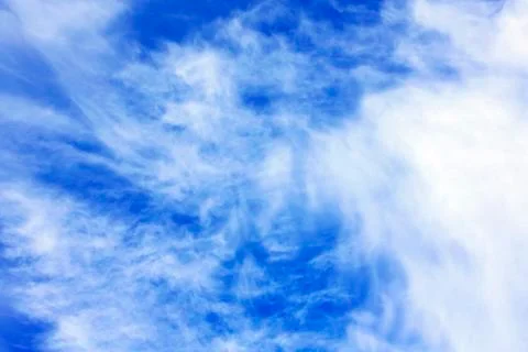 White clouds over blue sky Stock Photos