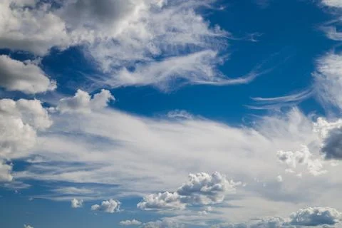 White clouds over blue sky background Stock Photos