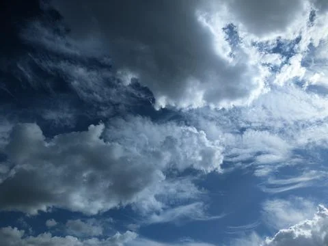 White clouds over blue sky background Stock Photos