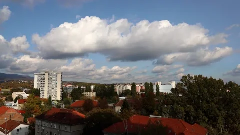 White clouds over the city Stock Footage 142137058