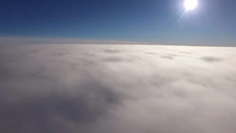 White clouds over the EGRIP camp research station on a icy landscape Stock Footage 104223415