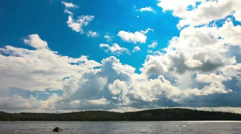 White Clouds over the Lake, timelapse Stock Footage 11524979