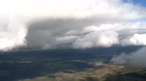 White clouds over land Stock Footage 67577691