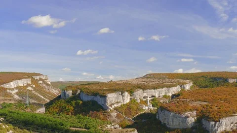   White clouds over mountain plateaus Stock Footage 81206285