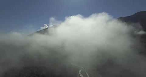 White clouds over the mountains Stock Footage 95136395