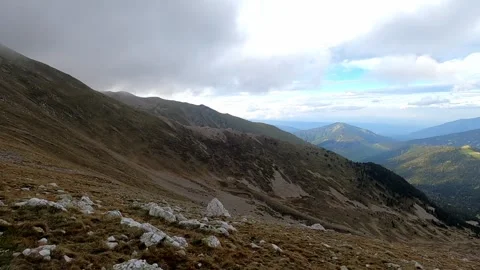 White clouds over the mountains Stock Footage 133285915