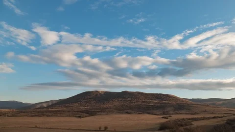 White clouds over mountains, time lapse Stock Footage 121816268