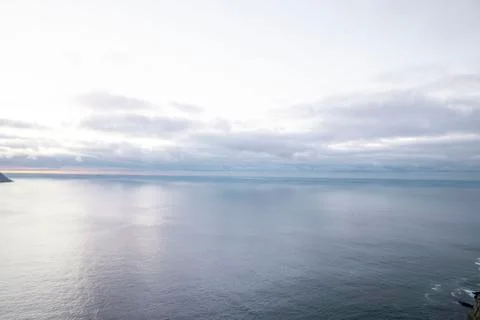 White clouds over open ocean Stock Photos
