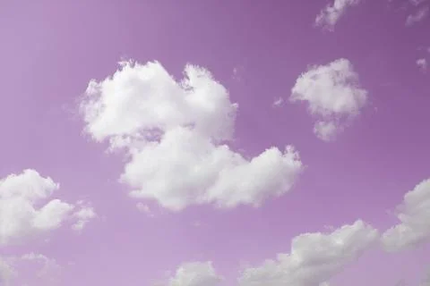 White clouds on pink sky background Stock Photos