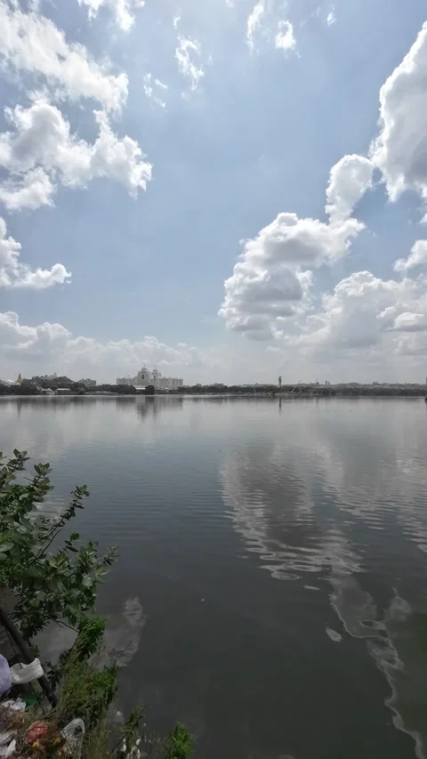 White Clouds Reflecting On Calm Water Lake During The Day Time Vertical Video Stock-Footage 317927625