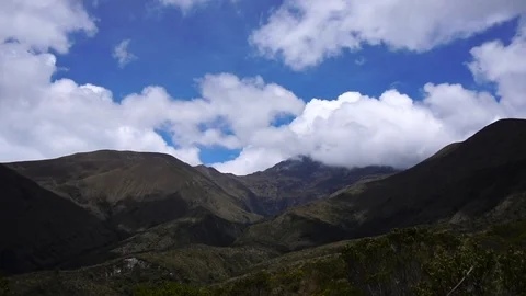White Clouds Rolling Over Mountain Top [Timelapse] Stock Footage 88346427