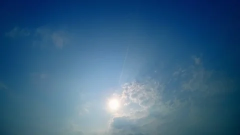 White clouds run across the blue sky. Timelapse Stock Footage 102617557