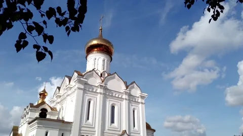 White clouds run over Orthodox church timelapse Stock Footage 146893474