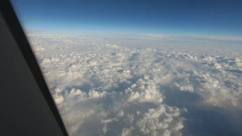 White clouds seen from the porthole of the plane Video stock 235738472