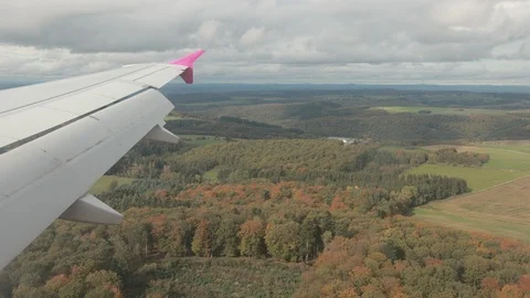 White clouds in the sky make shadows on earth, trees in forests, fields. 스톡 동영상 121243561