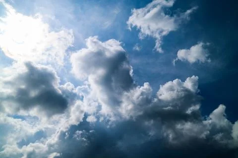 White clouds on the sky at noon. Stock Photos