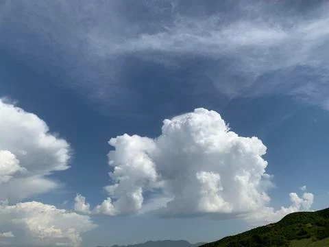 White clouds in the sky right before the storm Stock Photos