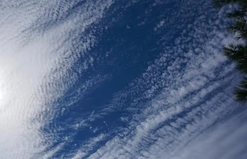 White clouds spread like a wave Stock Photos