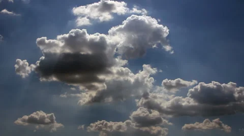 White clouds in sunbeams Stock Footage 34762720