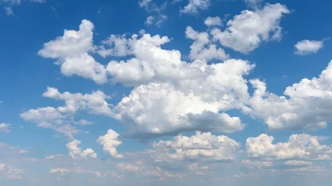 White clouds In sunny sky 4K timelapse Stock Footage 99436587