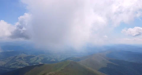 White clouds thicken over the mountains Stock Footage 167729592
