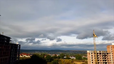 White clouds time lapse. Time lapse of clouds in the city. Stock Footage 231766311
