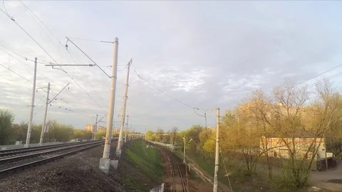 White clouds, trees and trains in the spring timelapse 스톡 동영상 82985544