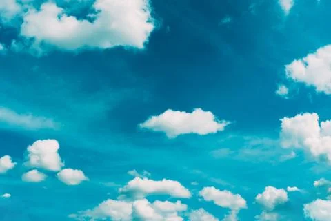 White clouds in turquoise sky background 库存照片