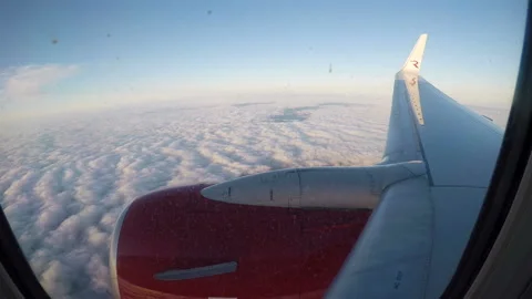 White clouds under the wing of the aircraft of the company "Russia" Stock Footage 129715791
