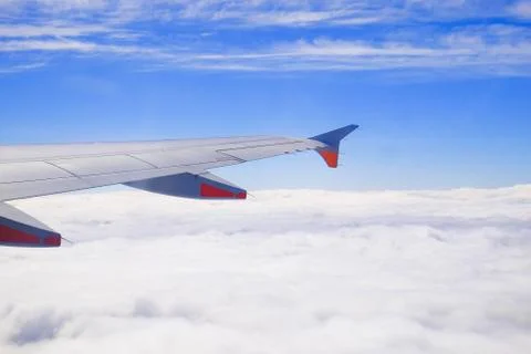 White clouds, view from above air plane window Stock Photos