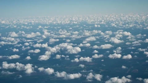 White clouds, view from the airplane. A lot of cumulus clouds. Stock Footage 308477877