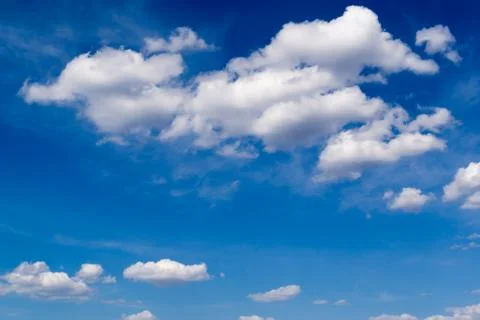 White Cloudscape and Blue Sky Stock Photos