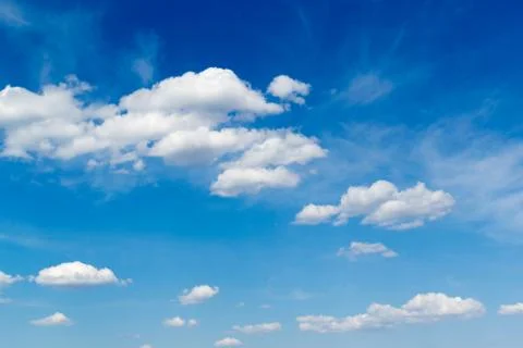 White Cloudscape and Blue Sky Stock Photos