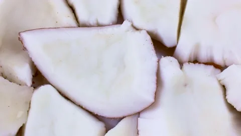 White coconut pieces texture circle rotation top view close up Stock Footage 236932111