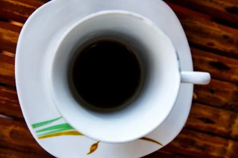 White coffe coup in table Stock Photos
