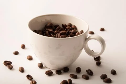 White coffee cup and roasted coffee beans wall art Stock Photos