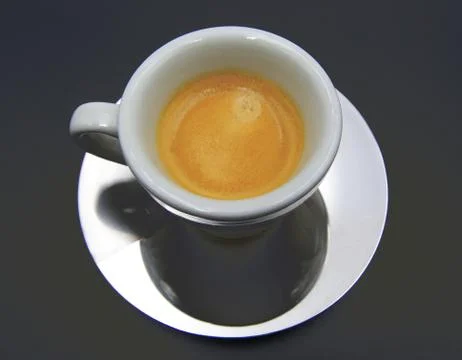 White coffee cup on dark table, italian espresso Stock Photos