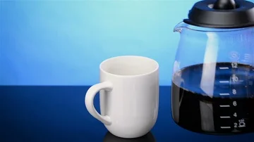 White Coffee Cup with Fresh Brewed Coffee with Zoom-in Stock Footage 86057600