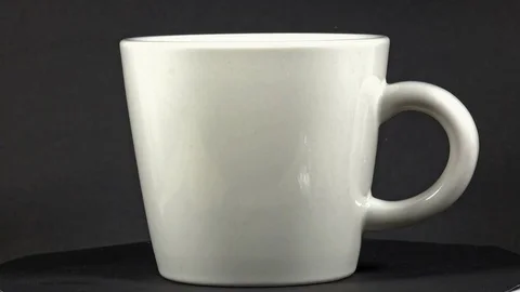 White Coffee Cup In Rotation Video stock 75453578