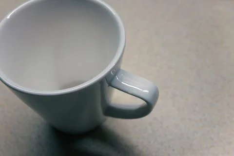 White coffee cup on table close up Stockfoto's