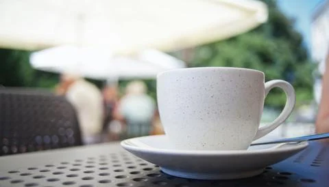 White Coffee Cup On A Table Stock Photos
