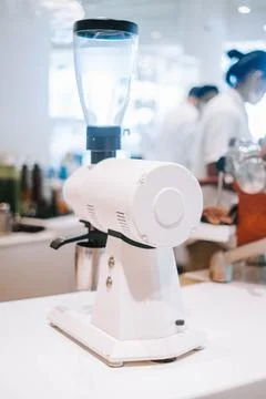 White coffee grinders in a cafe Stock Photos